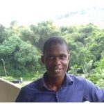 Samuel at the Faculty of Agriculture Building, Obafemi Awolowo University, Ile-Ife, Nigeria