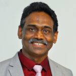 Dr Abraham Thomas
